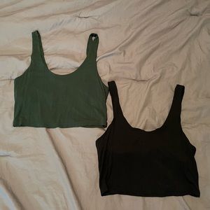 two sporty cropped tanks with built in hold